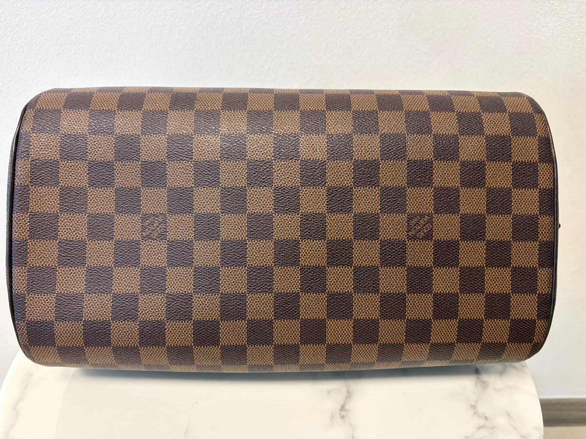 LOUIS VUITTON RIVERA MM